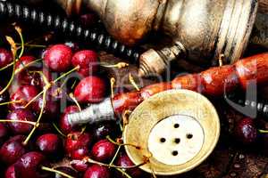 Stylish oriental shisha with cherries