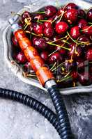 Stylish oriental shisha with cherries