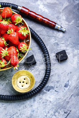 Stylish oriental shisha with strawberry