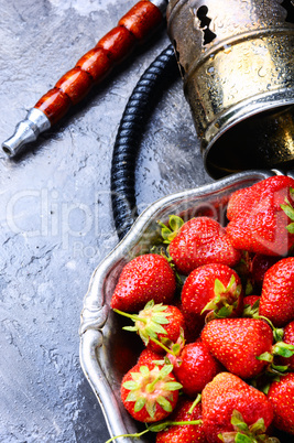 Stylish oriental shisha with strawberry