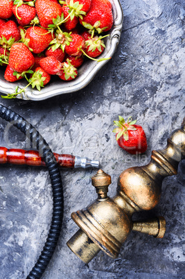 Stylish oriental shisha with strawberry