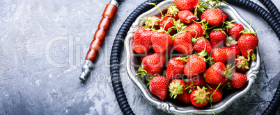 Stylish oriental shisha with strawberry