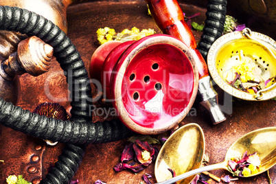 Oriental tobacco hookah with floral tea aroma