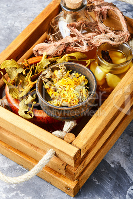 Healing herbs in wooden box