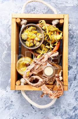 Healing herbs in wooden box