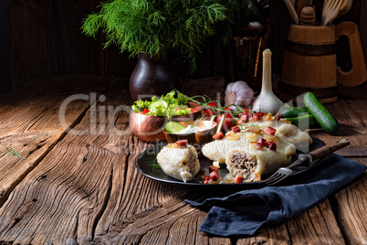 Rustic Cepelinai, a specialty Lithuanian and Polish cuisine.