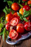 various types of tomatoes served and presented on the silver pla