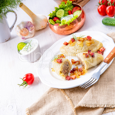 Rustic Cepelinai, a specialty Lithuanian and Polish cuisine.