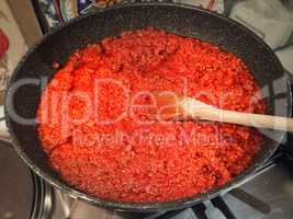 Preparing Italian Bolognese tomato sauce