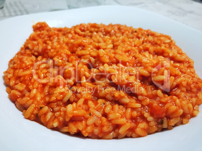 Italian risotto with tomato sauce