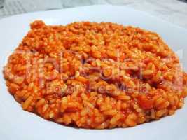 Italian risotto with tomato sauce