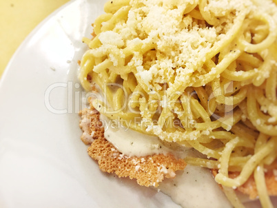 Portion of tonnarelli pasta with traditional cheese and pepper sauce
