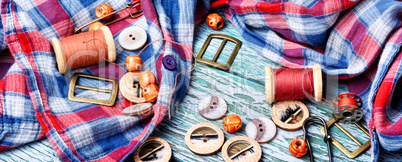 Sewing buttons and spools of thread