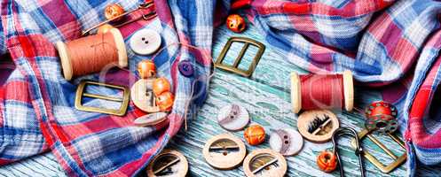 Sewing buttons and spools of thread