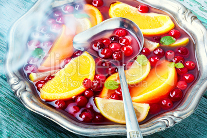 Cocktail with fruits and berries