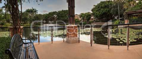 Bench overlooking a pond at the Garden of Hope and Courage