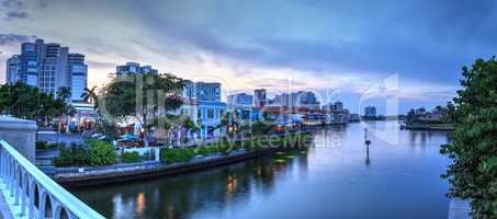 Pink Sunset over the colorful shops