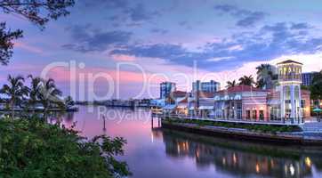 Pink Sunset over the colorful shops