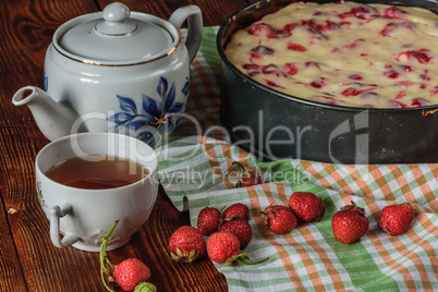 Breakfast with strawberry pie, black tea and berries