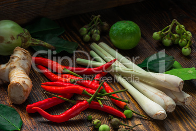 Tom yam ingredients set for Thai cuisine on wooden table