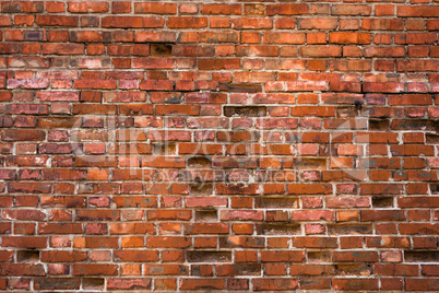 Old and weathered brick wall.