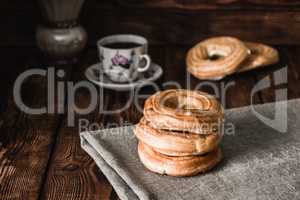 Eclairs stacked on the table