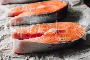 Raw Salmon Steak on Parchment Paper