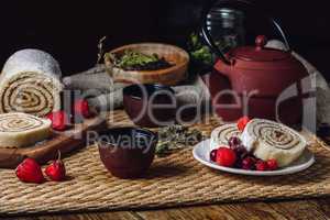 Tea with Berries and Sponge Roll with Berries.