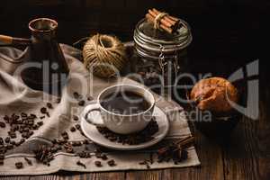Cup of Coffee on Tablecloth