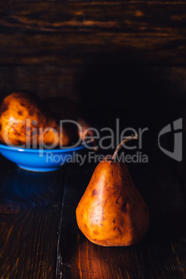 Golden Pear and Some on Background