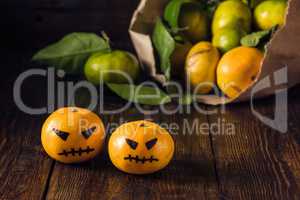 Two scary tangerines for Halloween