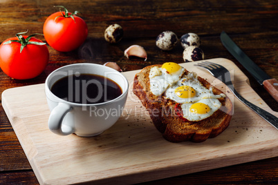 Cup of Coffee and Bruschetta with Fried Eggs
