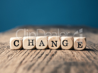 The word Change on small dices