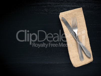 Flatware on a black table