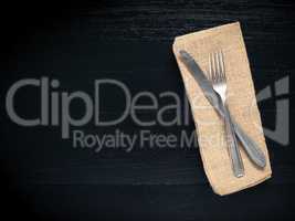 Flatware on a black table