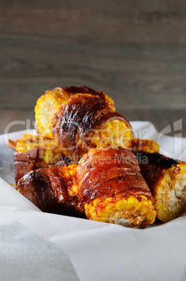 Grilled corn wrapped in bacon