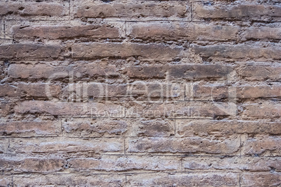 Vintage worn brick wall background texture.
