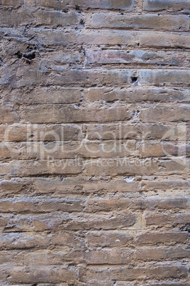 Worn brick wall texture.