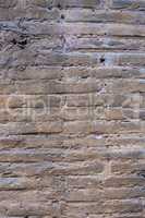Worn brick wall texture.