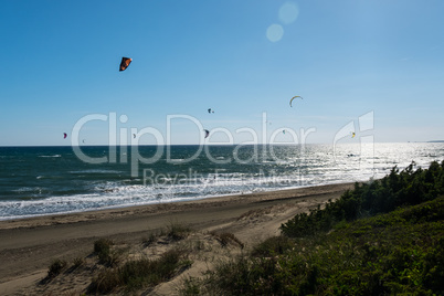Kitesurfing at the beach. Summer sports.