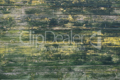 Worn wood plank wall texture background.
