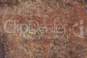 Rotten red concrete wall background texture.