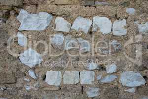 Detail view of white square stone brick wall.