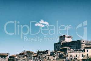 Landscape view of a medieval town with a castle with blue sky ba