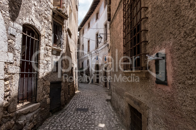 Letter on a mailbox on an alley of a medieval old town.