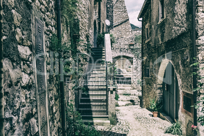 Metallic modern gate of a house on a medieval town.