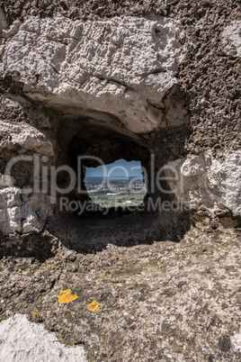 Background landscape from a square hole.