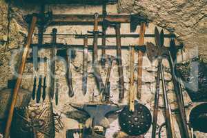 Medieval Knight weapons on a stone wall. Cool background.