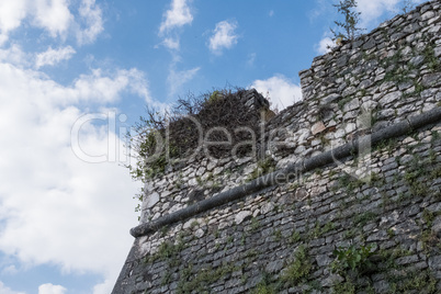 Nature from medieval walls of a castle with blue sky and clouds