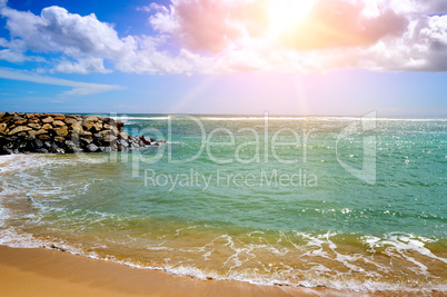 Sea landscape with rocky island. Beach. Sri Lanka.